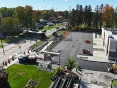 Aerial view of J. Hunziker Paving installing a new asphalt parking lot for Trader Joes