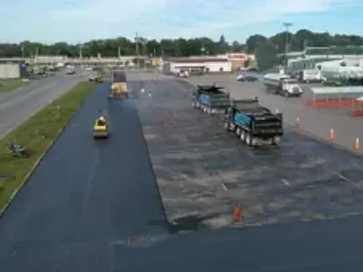 Drone footage of J. Hunziker Asphalt Paving crew during large commercial asphalt installation project