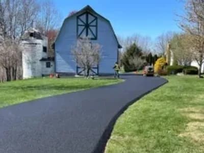 A newly installed driveway after a residential asphalt paving project by J. Hunziker Asphalt Paving