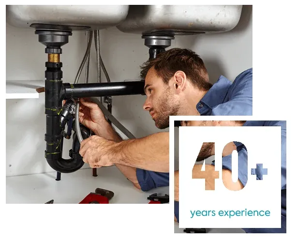 Fischer plumber and badge showing 40+ years of experience